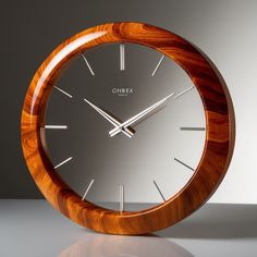 a wooden clock sitting on top of a table