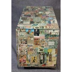 a multicolored chest with many different pictures on the front and sides, all over it