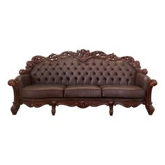 an old fashioned leather couch with ornate carvings on the arm and back, sitting against a white background