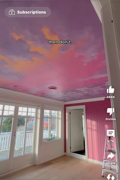 the ceiling is painted pink and purple with clouds on it, as well as a ladder