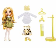 a doll with blonde hair and clothes next to a set of clothing, shoes and accessories