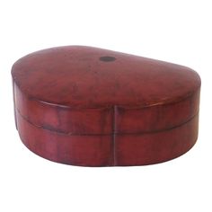 a round wooden box with no lid