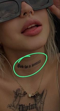 a woman wearing glasses with a green glow on her chest and neck that says don't be a woman