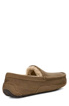 A versatile, smartly designed slipper is shaped from supple suede and grounded by a durable rubber sole for indoor and outdoor wear. The soft, cozy lining is made from either genuine shearling or UGGplush, a moisture-wicking textile made from a wool-rich blend but crafted to feel and wear like genuine shearling. Removable insole Leather upper/genuine-shearling or UGGplush wool-blend lining/rubber sole Shearling may be sourced from Australia, Ireland, Spain, the UK or the USA. See packaging for c Mens Uggs, Autumn Sales, Fabric Gift Bags, Nordstrom Store, Outdoor Wear, Fabric Gifts, Mens Slippers, Signature Design, Moisture Wicking