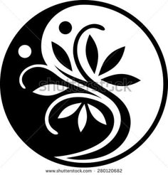 yin yang symbol with leaves and dots in the center stock photo 549872