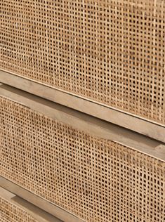 a close up view of some wood and rattan furniture with wicker on it