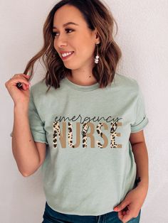 a woman wearing a t - shirt that says future nurse in leopard print on the front