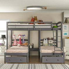 two children's bunk beds in a room with white walls and carpeted flooring