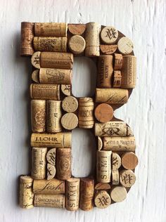 the letter h made out of wine corks