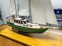 a model sailboat on display in a room