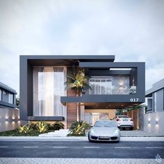 a car is parked in front of a modern house