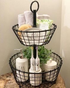 three tiered basket with soaps, lotions and other bathroom items on it