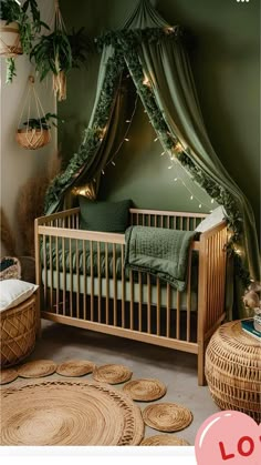 a baby crib with green curtains and lights