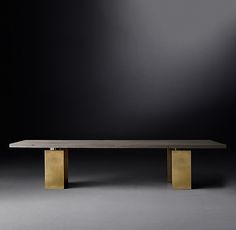 a wooden bench sitting on top of a black floor