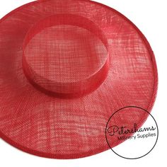 Boaters are all the rage, and this red sinamay fascinator version has us all in a twirl! Made from 2 layers of stiffened sinamay, these boaters are ready to trim and have a petersham ribbon on it's inside edge. Simply add a comb or headband to secure to the head.Hat base measures:Width: 37cm (14.5 inches)Crown Width: Measures 15.5cm (6.1 inches) wide at base and 14cm (5.5 inches) at top Crown Height: 4.5cm (1.7 inches)Please note our latest batch of boaters have been made slightly bigger this ti Adjustable Sinamay Top Hat, Red Flat Brim Boater Hat For Kentucky Derby, Red Brimmed Costume Hat One Size, Red Brimmed Hat Bands For Kentucky Derby, Red Brimmed Mini Hat, Red Brimmed Mini Hats For Spring, Red Hat Bands For Kentucky Derby, Red Brimmed Mini Hat, One Size Fits Most, Adjustable Flat Brim Red Boater Hat