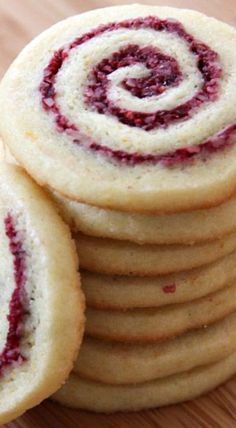 a stack of cookies sitting on top of a wooden table