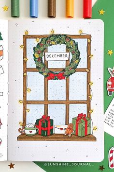 an open christmas window with presents on it and the words, december written in white