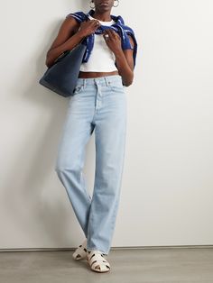 As the name suggests, AGOLDE's denim jeans have a straight-leg fit inspired by '90s styles. They're made from structured organic cotton and lightly distressed for a lived-in look. We love them with a tucked-in top and ankle boots. Couture, Jil Sander, Fit Inspired, Sport Swimwear, Sports Skirts, Short En Jean, Celebrity Look, Light Denim, Everyday Wardrobe