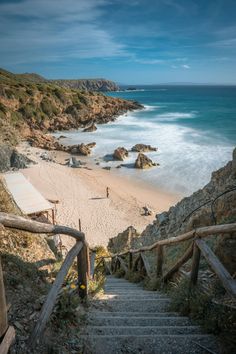 stairs leading down to the beach and ocean