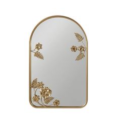 a mirror with gold flowers and leaves on the bottom, in front of a white background