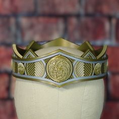 This is a raw 3D print of our interpretation of GoT Crown. These masks are printed in PLA and have some rough spots from the 3D printing process. Typical finishing work will need to be done to get them smooth. The color of the print may vary from the photo shown. These crowns come with no padding, straps, Velcro, or magnets. PLEASE MEASURE YOUR HEAD BEFORE PURCHASING. If the mask doesn't fit the buyer, the resale of the helmet is up to them. We do not issue refunds. The mask is printed in nine p Family Crest, Adult Costumes, The Mask, 3d Print, 3d Printing, Etsy Accessories, Adult Outfits, Accessory Gift, Gender Neutral