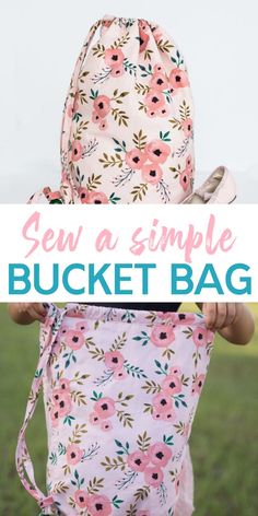 a girl holding a pink flowered bag with the words sew a simple bucket bag