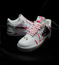 The White Voorhee Air Force 1 is a unique, one-of-a-kind sneaker, featuring a white base and signature Air Force 1 silhouette and machete mask panel. The sneaker is styled with Shoe Baker's signature &  red drip, plus a horror-themed twist that makes it impossible to look away, This sneaker is sure to make a statement. Base shoe will be ordered from Nike.com or similar venders that carry the authentic Nike Air force 1. Turnaround time typically take 2-4 weeks from the initial date of purchase. Custom Low-top Sneakers With Red Sole, Custom White Sneakers With Rubber Sole, Custom White Leather Sneakers, White Waterproof Custom Lace-up Sneakers, Custom White Sneakers With Waterproof Paint, White Custom Leather Sneakers With Waterproof Paint, White Leather Custom Sneakers With Waterproof Paint, Custom White Lace-up Sneakers, Custom Sneakers With Rubber Sole For Streetwear