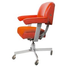 an orange leather office chair with wheels and casteors on the back, against a white background