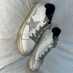 White Golden Goose Girls Tennis Shoes, Size 1 Great Condition, Barely Worn. Navy Inside, Silver Stars. Purchased From Nordstrom. Girls Tennis Shoes, Golden Goose Shoes, Golden Goose, Silver Stars, Tennis Shoes, Kids Shoes, Tennis, Shoes Sneakers, Nordstrom