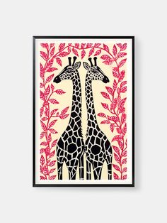 two giraffes standing next to each other with red leaves