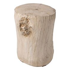 a wooden stump with a hole in the middle