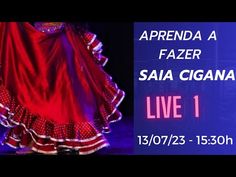 a woman in a red dress on stage with the words la fazer saa cigana live 1