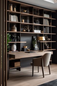 a room with a desk, chair and bookshelf