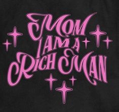 a black shirt with pink lettering that says mom, i am a richo man