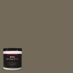 a jar of dymasty color paste on a white background