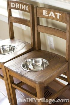 two wooden chairs with metal bowls on them and the words drink eat written on them