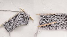 two knitting needles are next to a gray knitted object on a white surface, with yarn in the foreground