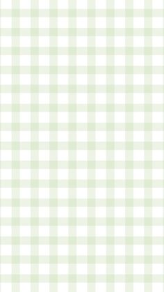 a green and white checkered background with small squares on the bottom right hand corner