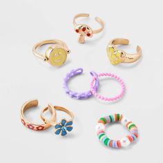 The Girls' 8pk Smiley Flip Ring Set - art class™ merges playful aesthetics with contemporary style. This set features a range of designs, from endearing hearts and cheerful smileys to elegant flowers and more, ensuring a diverse selection for every mood and occasion. The girls' 8pk smiley flip ring set from art class™ is easy to mix and match with various outfits. art class™: One-of-a-kind looks for the one and only you. Flip Ring, Dark Rings, Clothing Design Sketches, Brass Band, Bracelet Ideas, Cross Ring, Clothing Design, Elegant Flowers, The One And Only