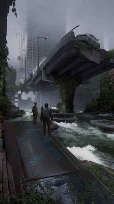 two people walking on a bridge over a river