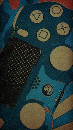 a close up of a video game controller on top of a blue and red background