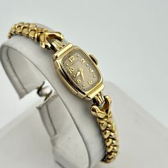 Vintage Hamilton Cocktail watch with 17 jewels set in ornate 10k rolled gold case Tropicalized dial. Made in Switzerland  Winds and keeps good time  Ships immediately Gold Heart Watch, Antique Watches Vintage, Little Gold Watch, Dainty Watches, Vintage Gold Watch, Cocktail Watch, Art Deco Watch, Classic Capsule Wardrobe, Vintage Watches Women