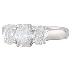 three stone diamond ring in 18k white gold, size 6 5 / 8 75ct