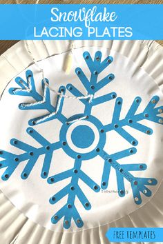 a paper plate with snowflake lacing plates on it