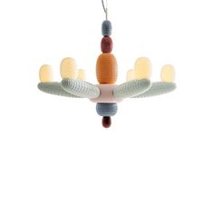 a multicolored bird toy hanging from the ceiling