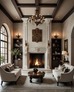 a living room filled with furniture and a fire place under a chandelier in front of a fireplace