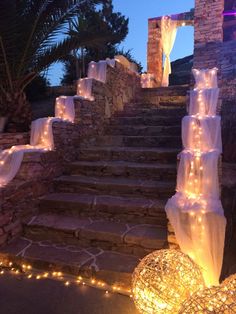 some lights that are on the steps outside