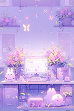 a desktop computer sitting on top of a desk next to flowers and butterflies in vases