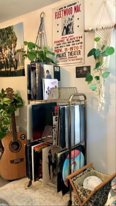 a living room filled with lots of furniture and bookshelves next to a plant