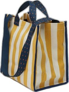 a yellow and white striped bag with blue handles